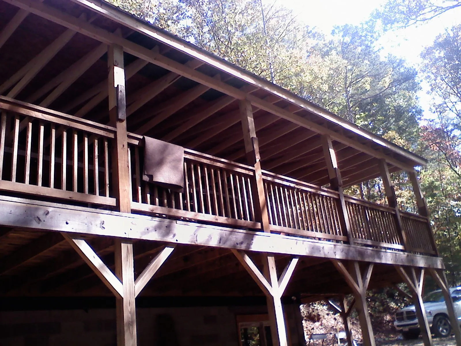 Timber framing under a new elevated porch and deck — Roof Leak Repair in Easton by Roofing Brothers